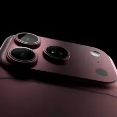 Trzy obiektywy aparatu w nowym, bordowym iPhonie 18, gotowe do uchwycenia przyszłości.