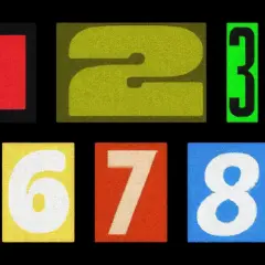 Numeri da 0 a 9 su sfondo nero. Il 9 è giallo su verde scuro. Come si dice 99 in inglese? Ninety-nine.