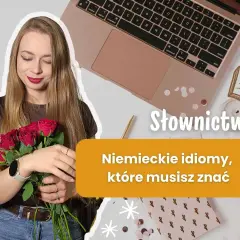 Dziewczyna z bukietem róż obok laptopa, uczy się słownictwa i niemieckich idiomów.