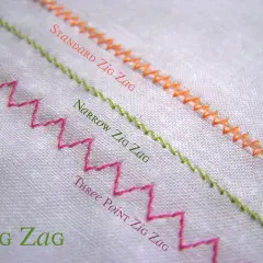 Three types of zig zag stitch shown on white fabric: standard, narrow, and three-point.