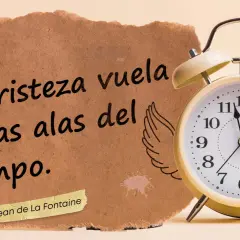 Un reloj y un trozo de papel con frases positivas cortas: "La tristeza vuela en las alas del tiempo.