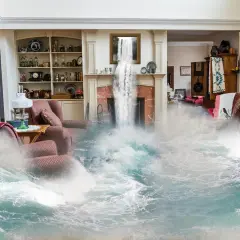 Un salón inundado, como si fuera un mal sueño, con agua cubriendo muebles y cascadas cayendo de la chimenea.