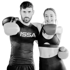 A man and woman in boxing gloves ready to punch, embodying the intensity of hiit boxing.