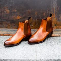 Eleganckie, brązowe sztyblety ze skóry, idealne na jesień. Co to za buty? To klasyka stylu!