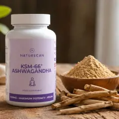 Frasco de KSM-66 Ashwagandha, polvo y raíces. Considerar ashwagandha contraindicaciones antes de su uso.
