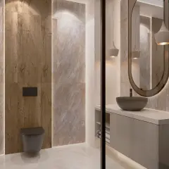 Nowoczesna łazienka z płytkami 120x60 ułożonymi pionowo, imitującymi drewno i kamień. Elegancka umywalka nablatowa i podwieszana toaleta.