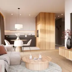 Przytulny salon z sofą, stolikiem kawowym i aneksem kuchennym w stylu japandi. Drewniane akcenty i neutralne kolory tworzą harmonię.