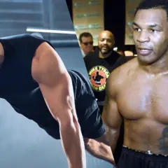 A man does push-ups, inspired by the legendary Mike Tyson push ups benefits.