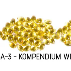 Żółte kapsułki omega-3 ułożone w kształt ryby. To esencja zdrowia, która wspiera organizm.