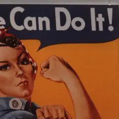 En person håller upp en affisch med Rosie the Riveter och texten "We Can Do It!". En symbol för styrka och beslutsamhet.