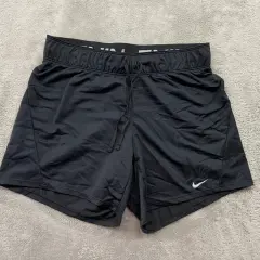 Czarne spodenki Nike Dri-Fit damskie, idealne na trening. Elastyczny pas i sznurek zapewniają komfort.