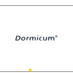 Napis "Dormicum" z małą żółtą kropką poniżej. Dormicum to nazwa handlowa leku zawierającego midazolam.