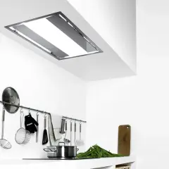 Cappa a scomparsa in cartongesso, elegante e funzionale, illumina la cucina moderna.
