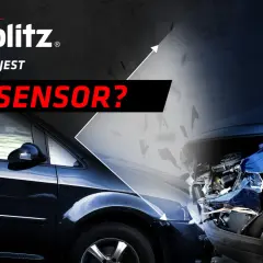 Xblitz pyta: g sensor co to? Obraz przedstawia dwa samochody, jeden cały, drugi po wypadku.