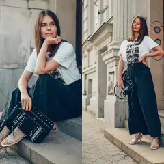 Kobieta w luźnych spodniach i t-shircie z motywem zwierzęcym, z torebką Desigual ozdobioną ćwiekami.