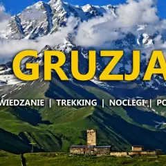 Majestatyczne góry Kaukazu, kamienna wieża i zielone wzgórza – idealne miejsce na wycieczkę do Gruzji. Zwiedzanie, trekking, noclegi i porady.