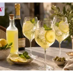 Orzeźwiający limoncello spritz z cytryną i miętą, idealny na letnie popołudnie.