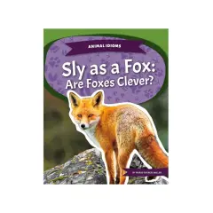 Rudy lis na kamieniu, okładka książki "Sly as a Fox: Are Foxes Clever?".