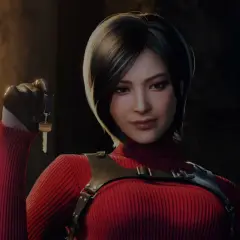 Ada Wong w czerwonym golfie i czarnych rękawiczkach trzyma klucz.