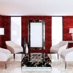 Elegancki salon z tapetą w ciemny czerwony kolor, białymi fotelami i marmurowym stolikiem.