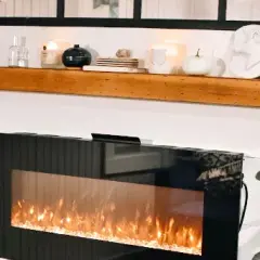 Co postawić na kominku? 10 inspiracji, które odmieniają wnętrze