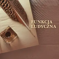Pióro i kałamarz na otwartej księdze, symbolizujące funkcję ludyczną pisania i tworzenia.