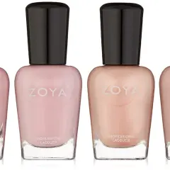 Fyra flaskor zoya nagellack i nyanser av rosa och beige.