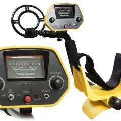 Żółty wykrywacz metali z czarną cewką i wyświetlaczem analogowym.