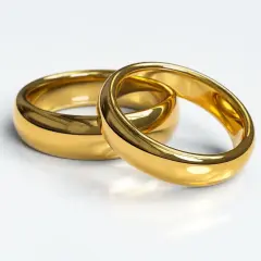 Dwa złote obrączki, symbol wiecznej miłości, lśnią na białym tle. 585.