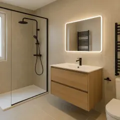 Salle de bain fonctionnelle avec douche, meuble vasque en bois, miroir lumineux et radiateur noir.