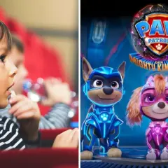 Ein Kind im Kino schaut gespannt auf die Leinwand, auf der die Helden von Paw Patrol – Der Kinofilm zu sehen sind.