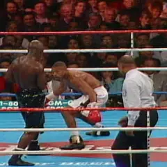 Roy Jones Jr. in the ring, a moment from what many consider his best fight. The crowd watches intently as he faces his opponent.