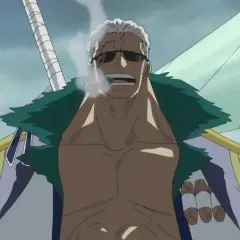 Captain Smoker, mit Sonnenbrille und Zigarre im Mund, raucht genüsslich. Seine Uniform ist mit goldenen Epauletten verziert.