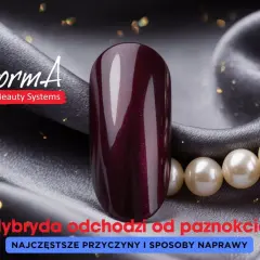Ciemny lakier hybrydowy na tle jedwabiu z pereł.