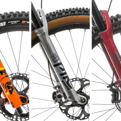 Comparing the iconic orange Fox Factory 36 and two RockShox forks, Lyrik Ultimate and another, for your next mountain bike build.