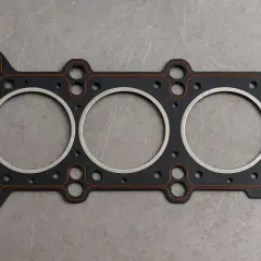 Guarnizione testata motore a 3 cilindri, nuova e pronta per il montaggio. Rifare testata motore conviene per prestazioni ottimali.