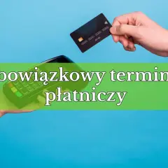 Dłoń trzyma kartę płatniczą nad terminalem. Czy terminal płatniczy jest obowiązkowy?