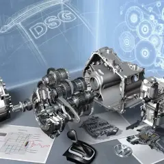 Rozłożony na części mechanizm skrzyni biegów DSG, z widocznymi trybami i schematami technicznymi.