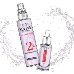 Elvive Hidra Hialurónico sérum como usar: dos productos L'Oréal con ácido hialurónico, uno en spray y otro con cuentagotas, rodeados de salpicaduras de agua.