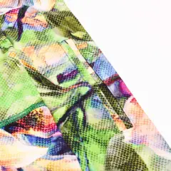 Close-up of a pocket on colorful floral leggings, showing how to add pockets to leggings with neat stitching.