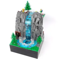 Eine beeindruckende LEGO-Landschaft mit einem Wasserfall, Bäumen und Wanderern. Inspiriert von einer LEGO Classic Bauanleitung, zeigt sie die Kreativität beim Bauen.
