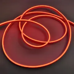 Jasny, czerwony neon wijący się na ciemnym tle.