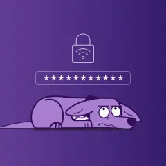 Smutny piesek pod polem z gwiazdkami, symbolizującymi hasło. Nad nim kłódka z ikoną Wi-Fi, wskazująca na klucz zabezpieczeń sieciowych.