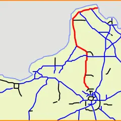 Carte routière montrant les sorties autoroute A16 en rouge, traversant une zone urbaine et des routes secondaires bleues.