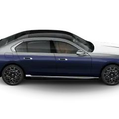 Eleganckie bmw i7 w dwukolorowym malowaniu, z ciemnoniebieskim nadwoziem i srebrnym dachem, prezentuje się luksusowo.