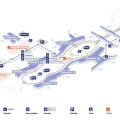 Plan de l'aéroport Roissy-CDG montrant les terminaux, les navettes, les trains RER B et les hôtels. La distance Roissy Paris centre est indiquée.
