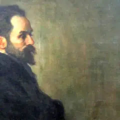 Portret mężczyzny z brodą i wąsami, w ciemnym ubraniu. Widać jego profil. Szymon Gajowiec poglądy.