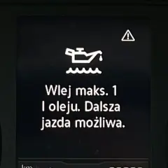 Na desce rozdzielczej świeci się kontrolka oleju z komunikatem "Wlej maks. 1 l oleju. Dalsza jazda możliwa.