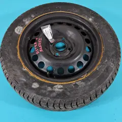 Koło zapasowe do Opel Astra G, z widocznym rozstawem śrub. Opona Continental 185/65 R15.