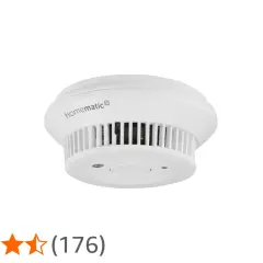 Homematic IP Rauchmelder im Test: Ein weißer, runder Rauchmelder mit Lüftungsschlitzen und einem zentralen Knopf.